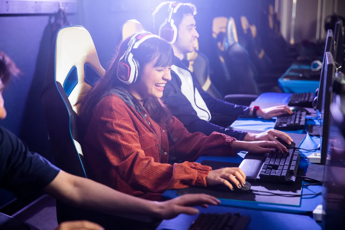 Woman playing Esports with team.