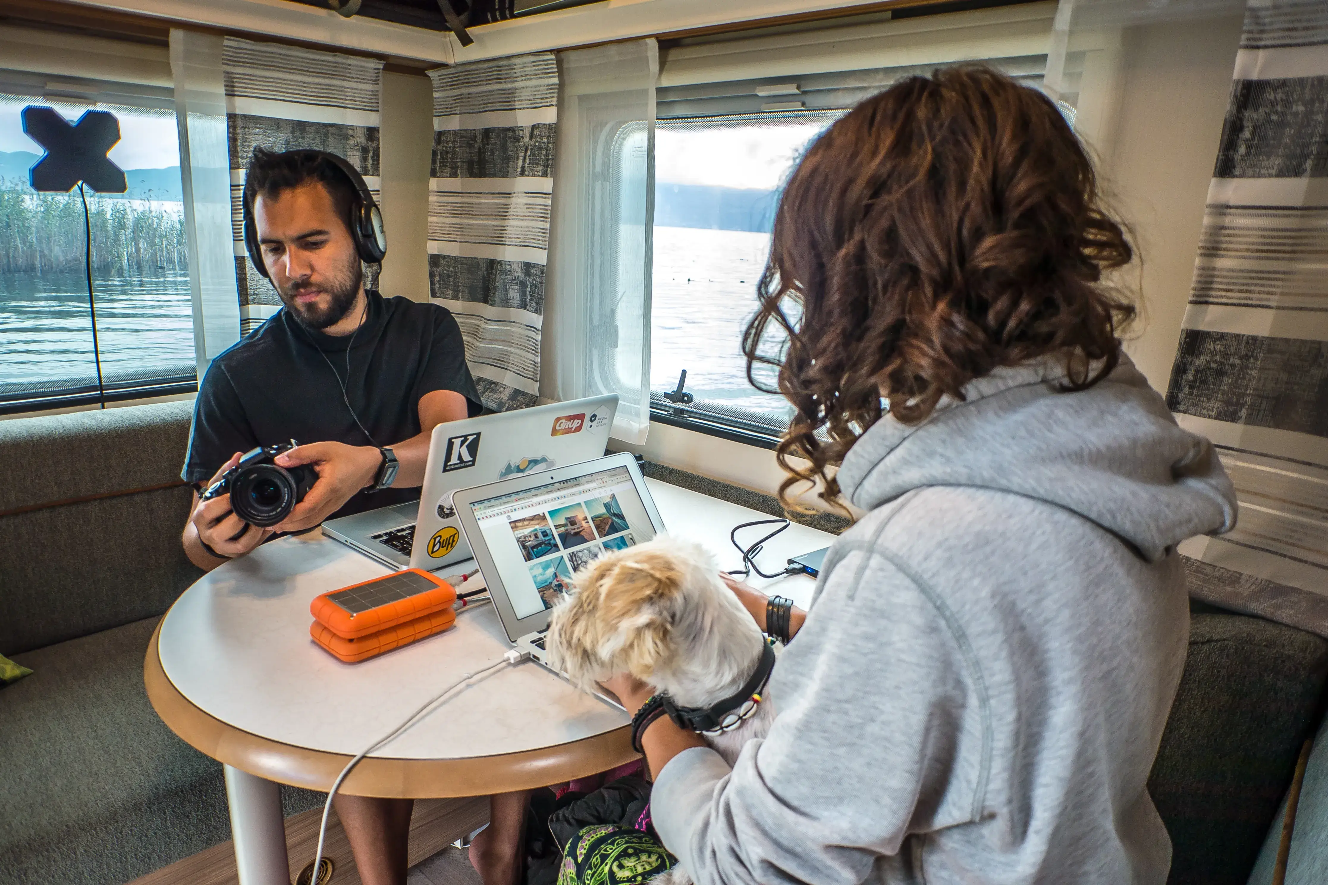In the camper, creating content.